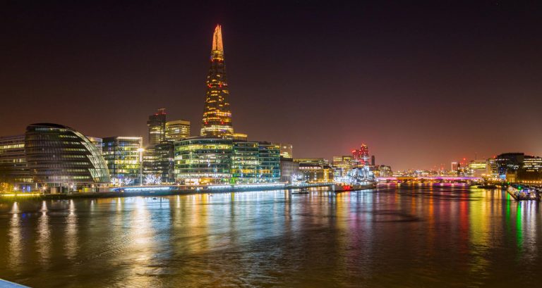 the shard among other building of london illuminated at night england